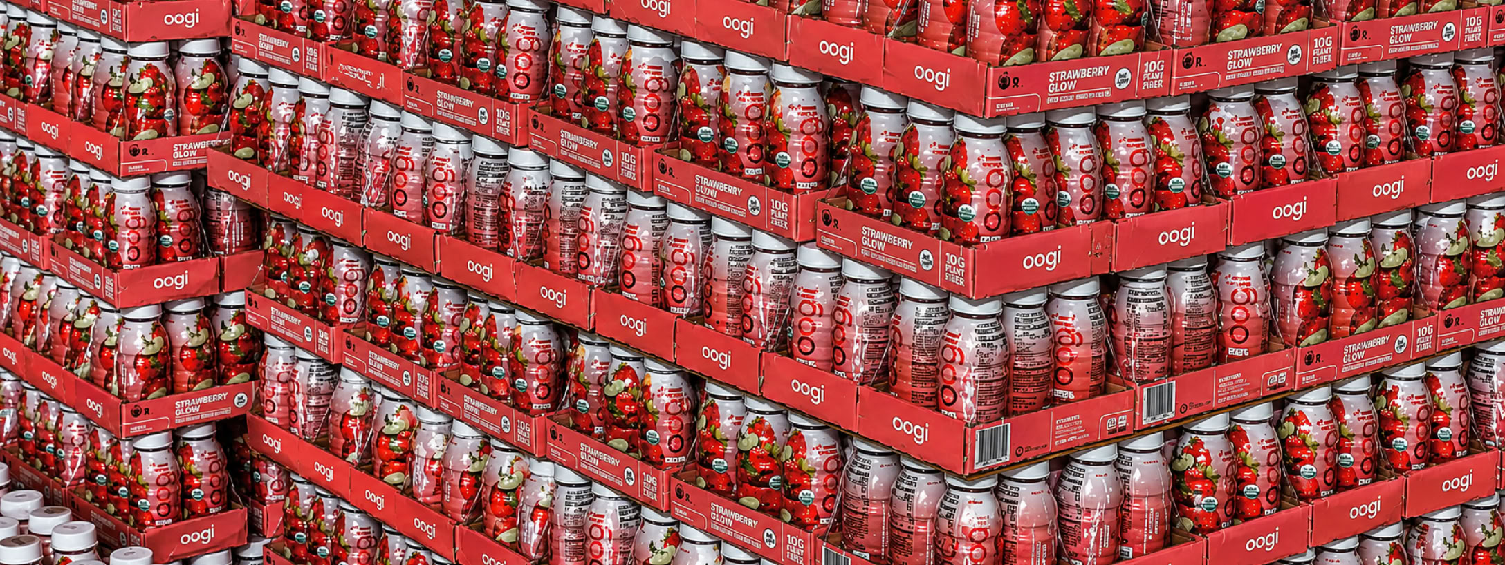 Beverages packed in trays for Costco and stacked on pallets for distribution at Nutrition Labs 
