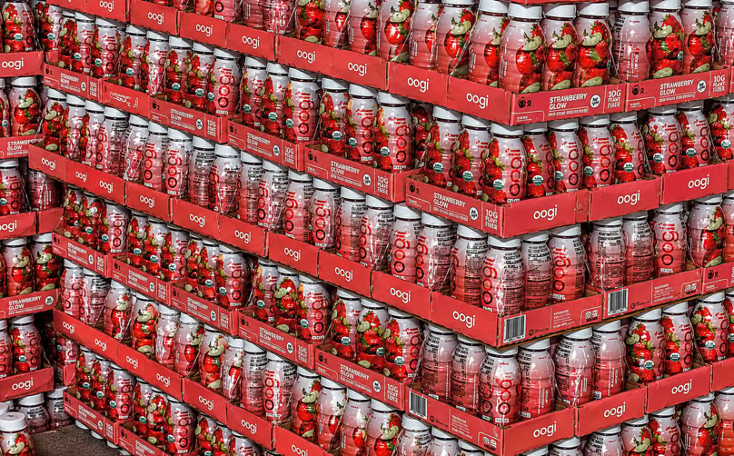 Beverages packed in trays for Costco and stacked on pallets for distribution at Nutrition Labs 